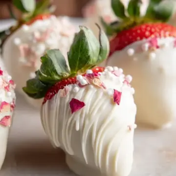 WHITE CHOCOLATE AND ROSE COVERED STRAWBERRIES
