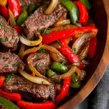 Steak with Peppers and Onions